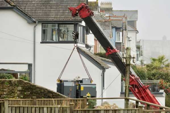 10 March 2020 - 13-51-00 
Didn't take long at all - the old one had been lifted out earlier. And then all the crane driver had to do was......reverse out of Above Town. Probably not quite so simples.
-------------- 
Crane in narrow Dartmouth road Above Town